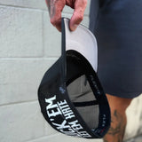 LET EM HATE SIDE STYLE FLEXFIT HAT